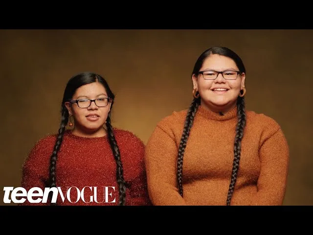 Two young women being interviewed for Teen Vogue topic 