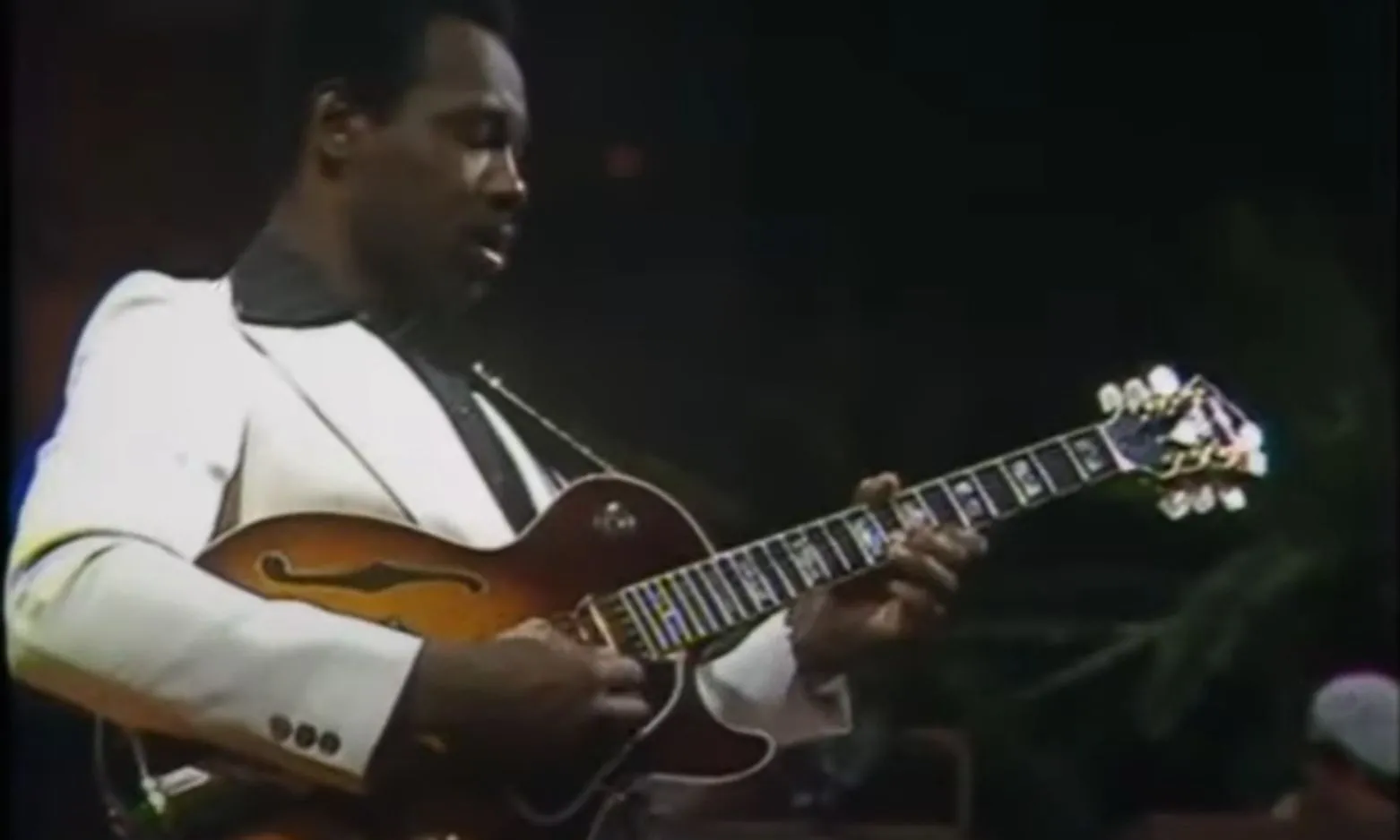 a man playing guitar